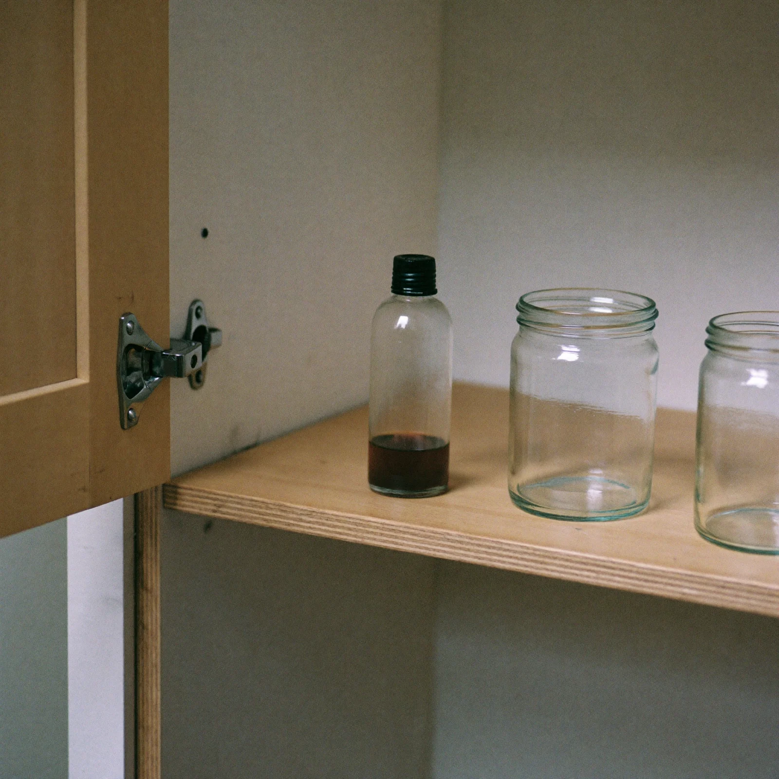 Does imitation vanilla extract go bad? A capped bottle of imitation vanilla in a cool cupboard