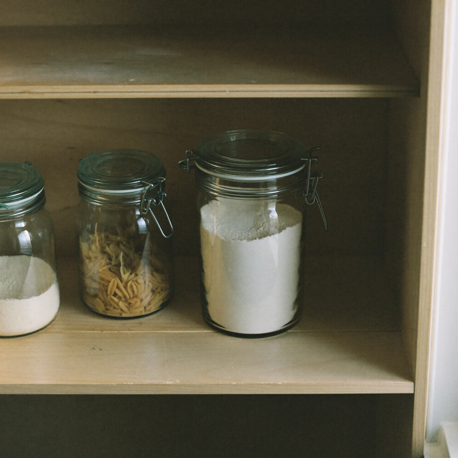 Does self-rising flour go bad? An airtight canister of self-rising flour on a cool cupboard shelf