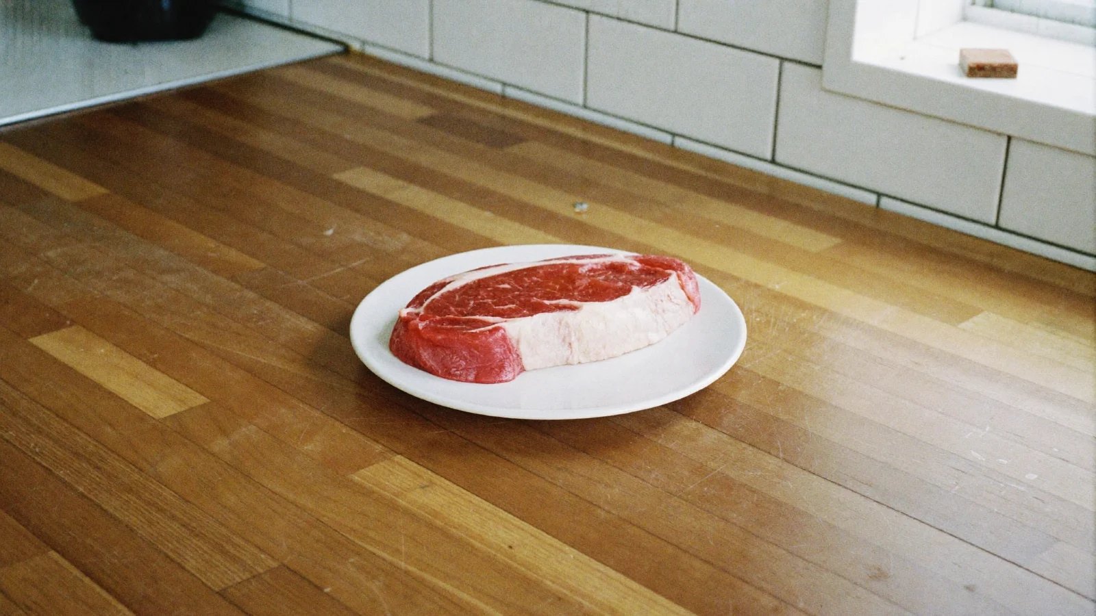 A fresh steak with a bright cherry red surface